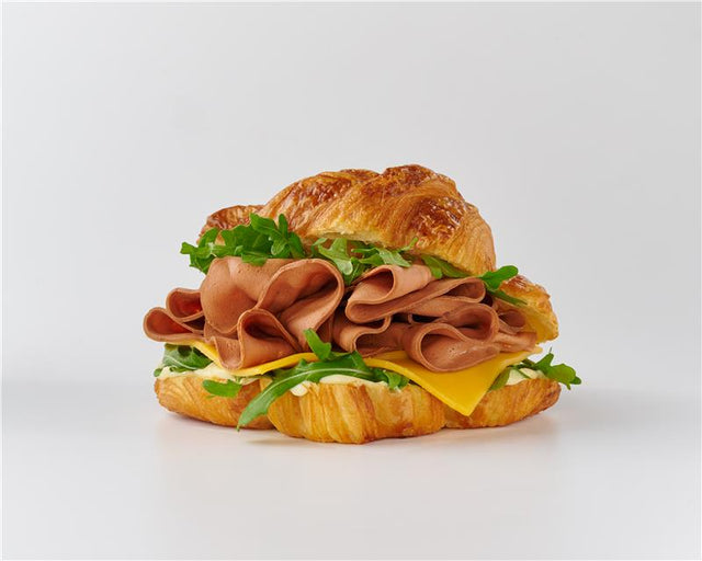 Spring Into Flavor: Plant-Based Ham Croissant with Honey Mustard & Arugula